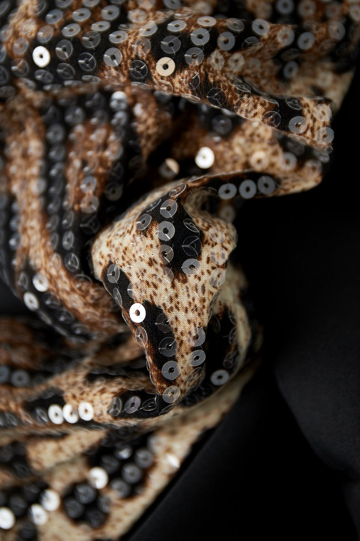 Blazer met panterprint glitter mouw