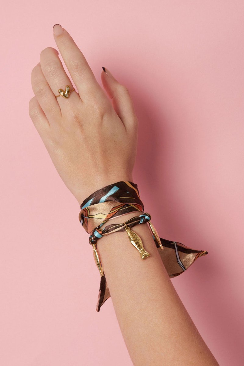 Armband met strik en visvormige bedelsRojaluxe