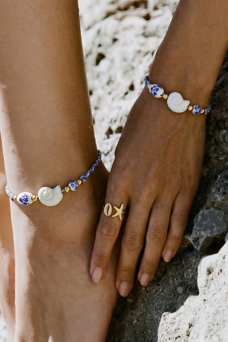Armband van touw met schelp en kralen met bloemdesign - 2 kleurenRojaluxe
