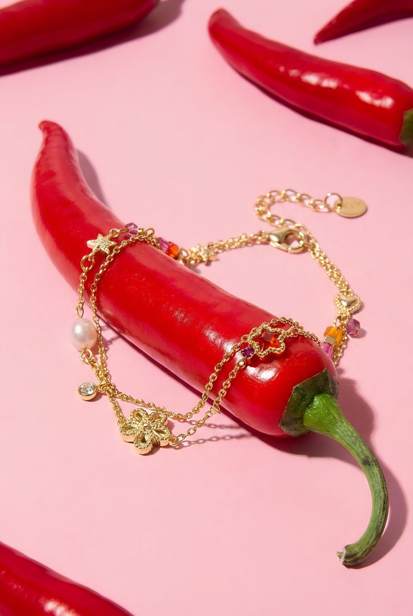 Bedelarmband met ster en bloemcharms, parels, steentjes en kraaltjesRojaluxe