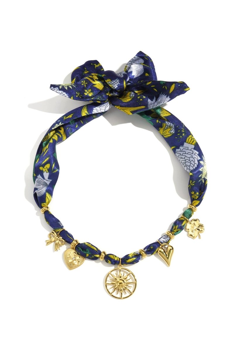 Choker met stoffen band en zon hangerRojaluxe