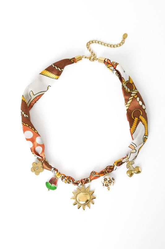 Choker met stoffen band en zon hangerRojaluxe