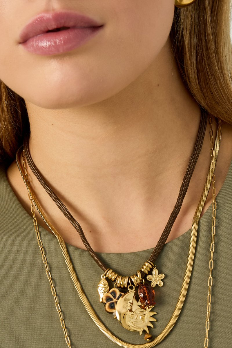 Choker met stoffen band en zon-maan hangerRojaluxe