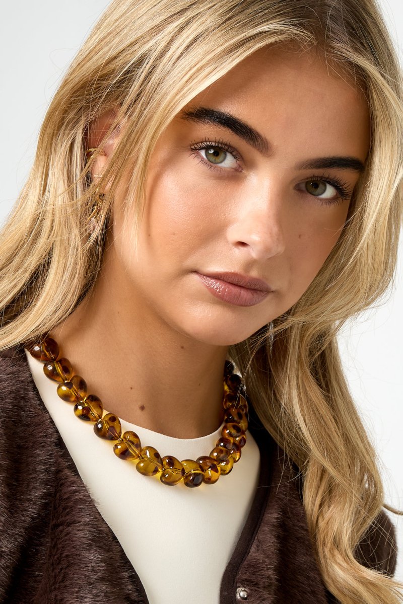 Ketting met amberkleurige kralenRojaluxe