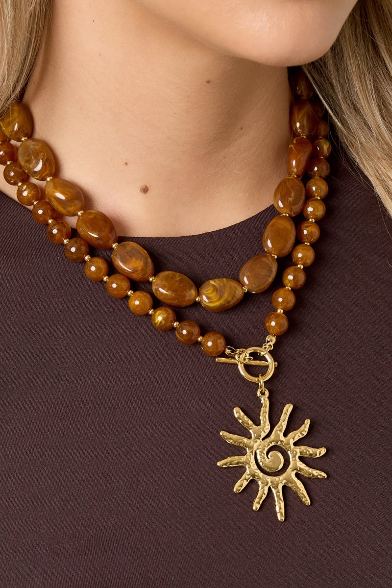 Ketting met kralen en zon hanger - 2 kleurenRojaluxe