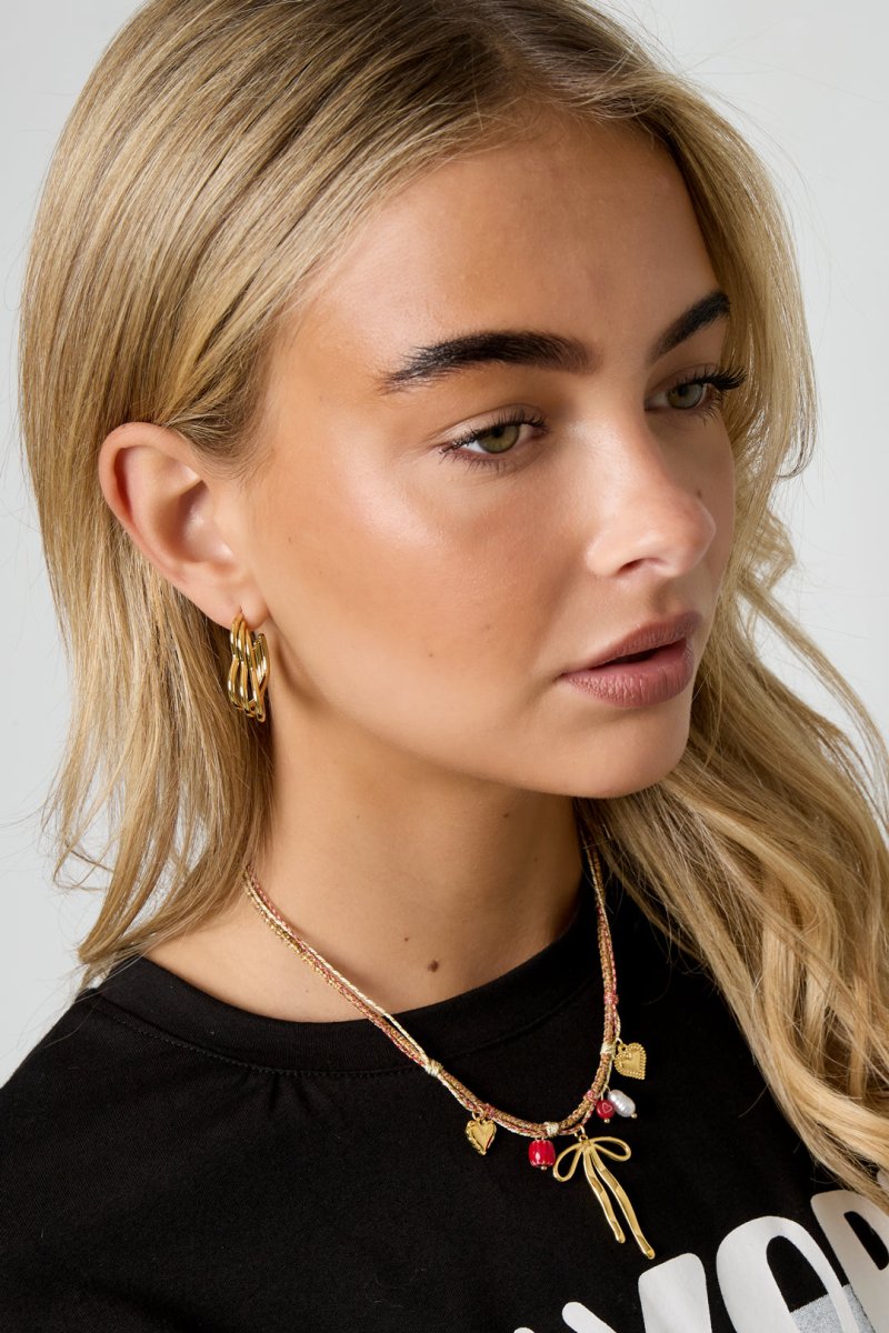 Ketting met strik hanger en hartdetailsRojaluxe