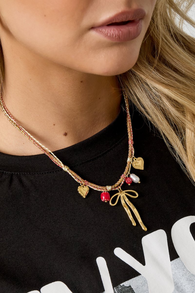 Ketting met strik hanger en hartdetailsRojaluxe