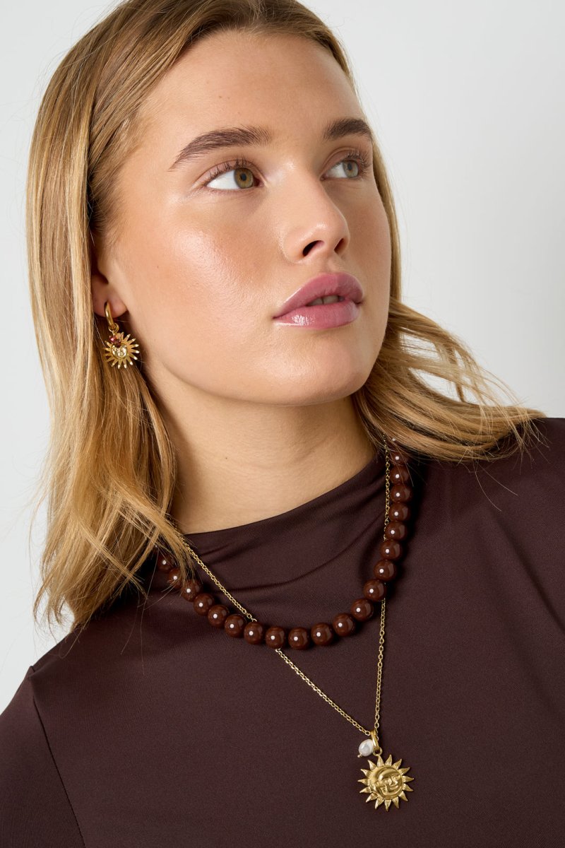 Ketting met zon hanger en parel detailRojaluxe