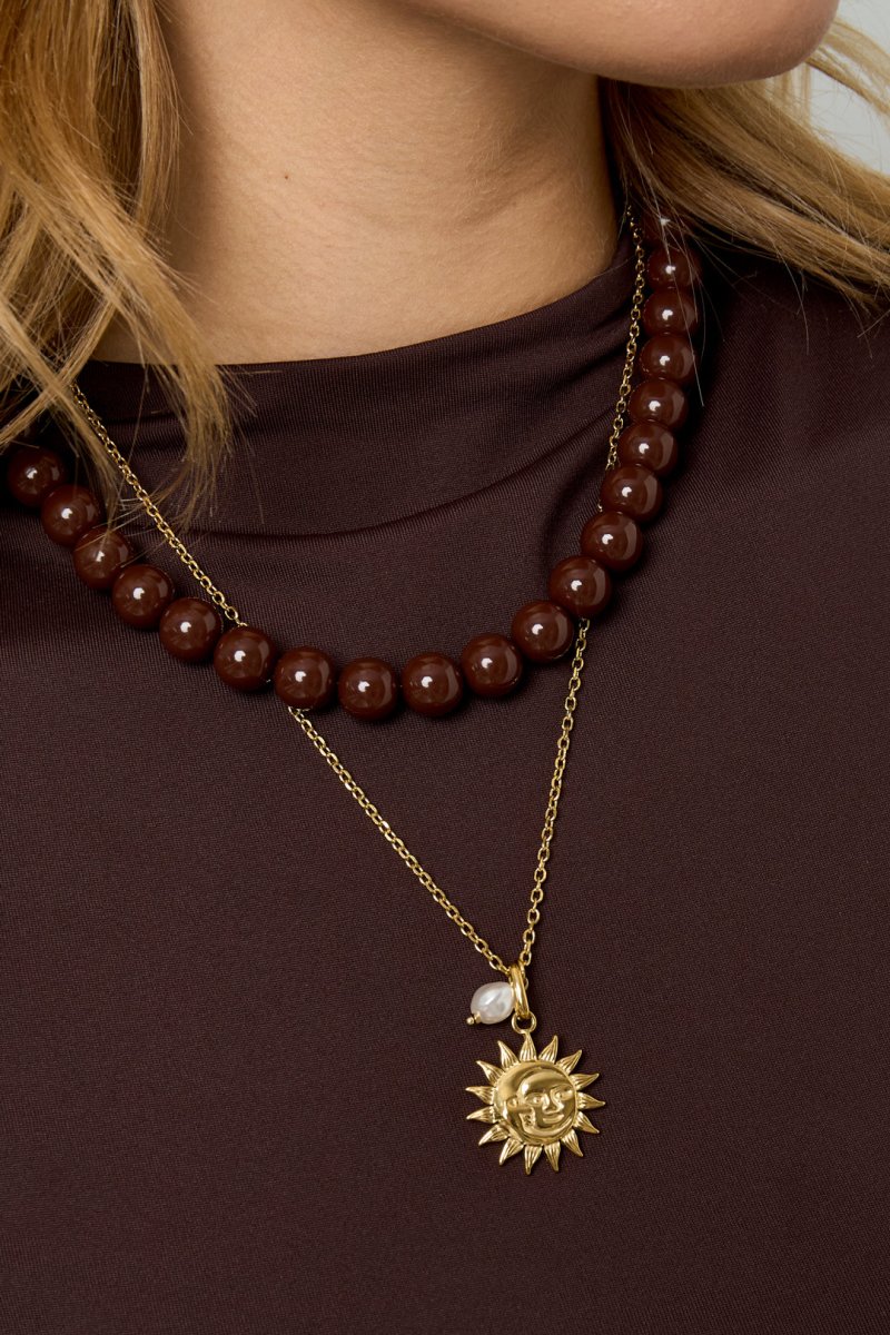 Ketting met zon hanger en parel detailRojaluxe