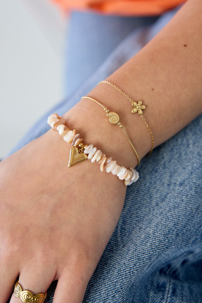 Minimalistische armband met spiraalschelpRojaluxe
