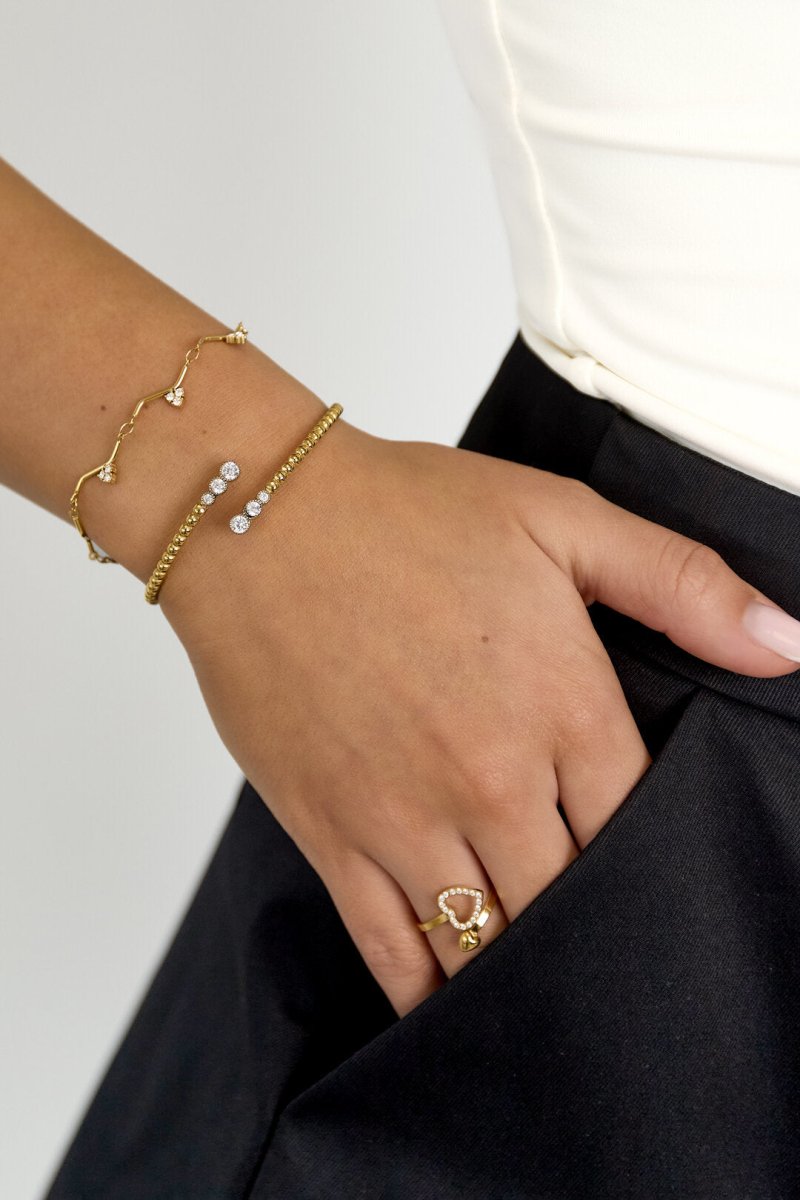 Symmetrisch gestipte bangle met gedetailleerde uiteindenRojaluxe